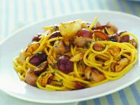 chitarrine-con-coniglio-olive-e-mandorle-piccanti ricetta