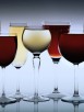 Row Of Assorted Red And White Wines In Wine Glasses