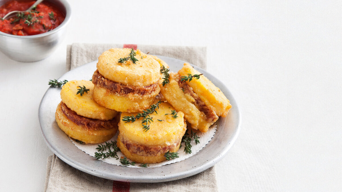Bignè di polenta con zampone e formaggio alla Telesforo Fini