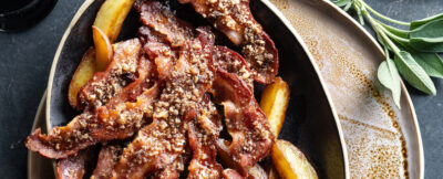 Bacon pralinato con patate arrostite