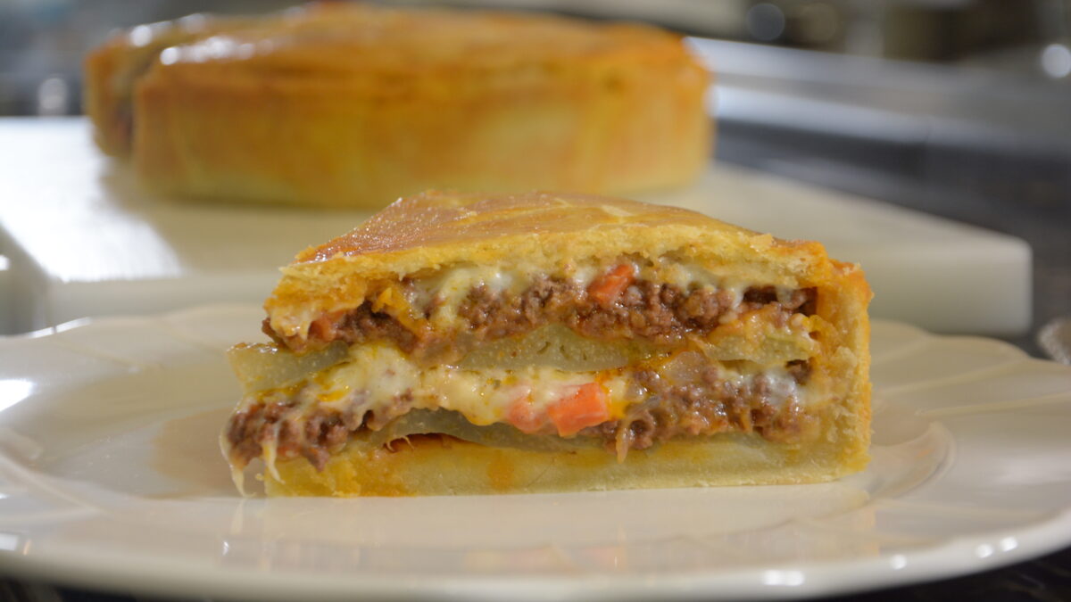 Timballo di cardi fritti con ragù di manzo alla bolognese