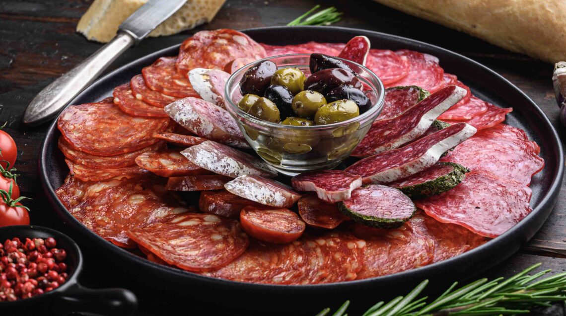 Traditional spanish tapas. Chorizo, salchichon, longaniza and fuet