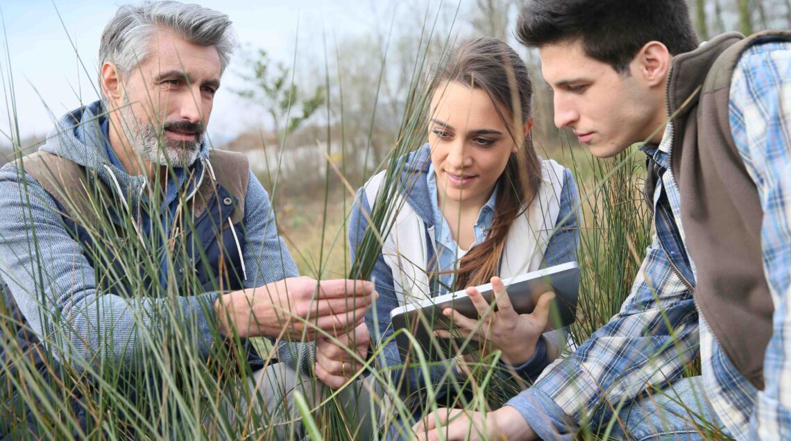 Teacher with students in agronomy