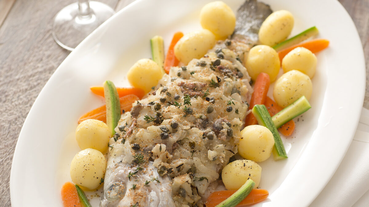 Orata gratinata alle cipolle e acciughe