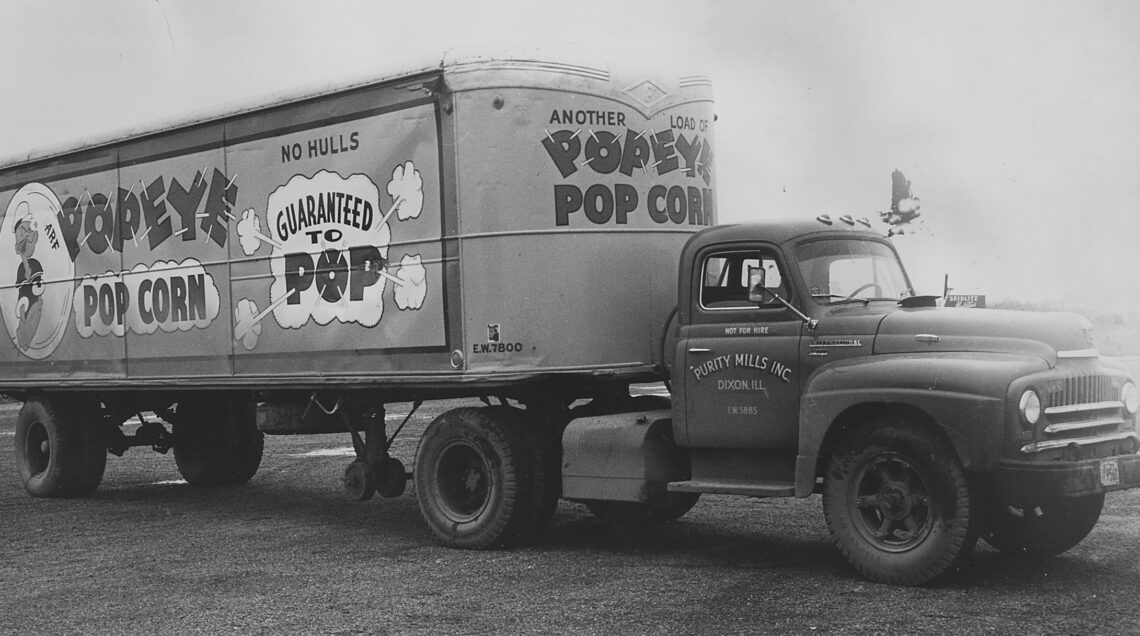 A_Popeye_popcorn_truck_with_a_colorful_advertising_design_-_NARA_-_283764_