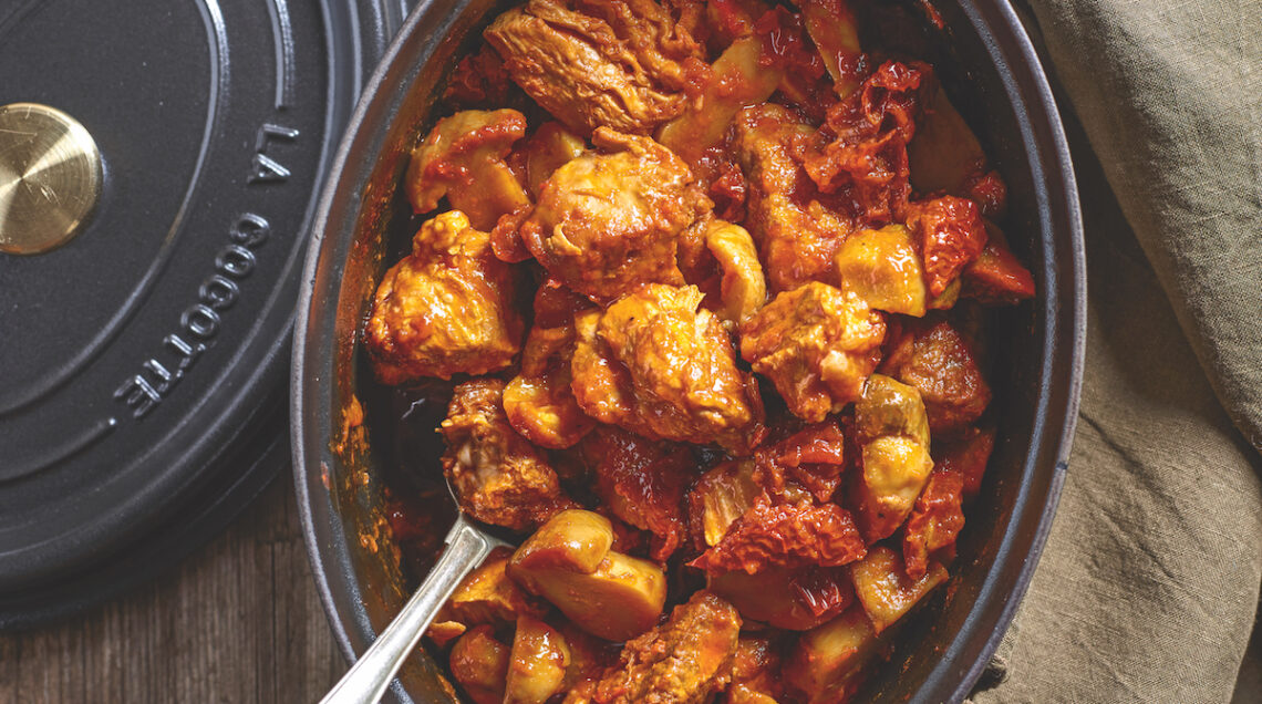 maiale in umido con porcini