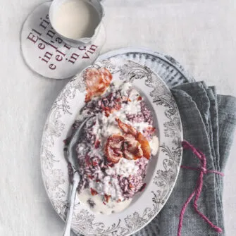 Riso Al Vino Rosso Con Fonduta E Crudo Croccante -