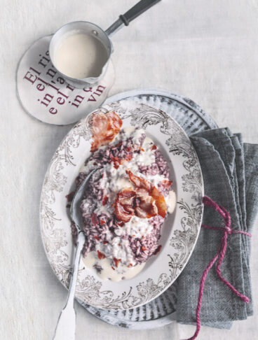 Riso Al Vino Rosso Con Fonduta E Crudo Croccante -