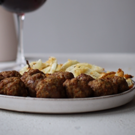 Polpette speziate con finocchi gratinati