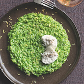Risotto con pesto di cime di rapa, burrata e limone