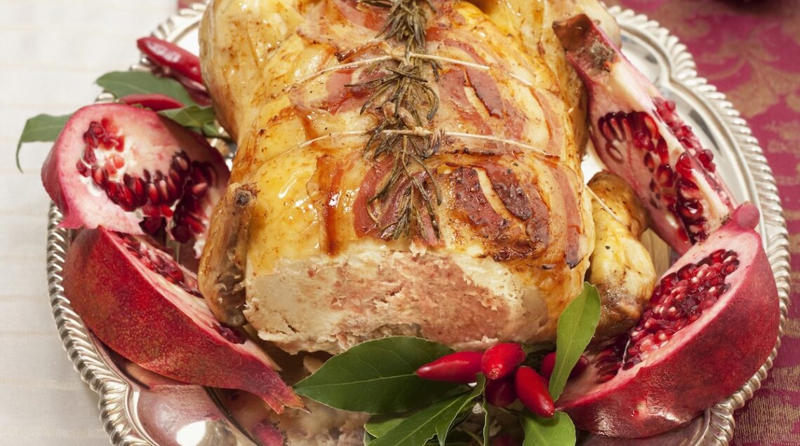 cappone farcito con contorno di melagrane