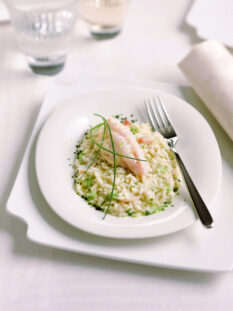 Risotto con filetti di tinca e cipolle stufate