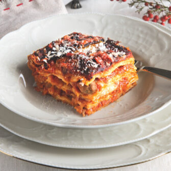 timballo di crespellel con polpettine al sugo e mozzarella