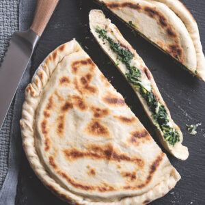 focaccia chiusa ripiena di erbette, provola e acciughe