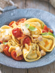 Tortelli di mare con carnia, burrata e melanzane