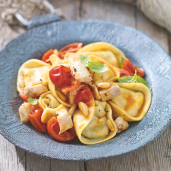 Tortelli di mare con carnia, burrata e melanzane