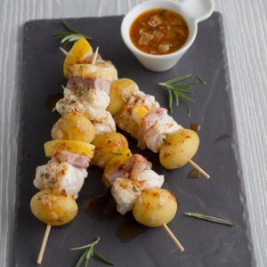 Spiedini di pescatrice alla pancetta