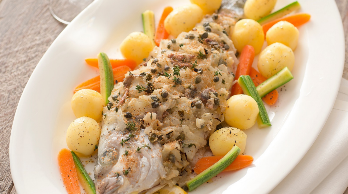 Orata gratinata alle cipolle e acciughe